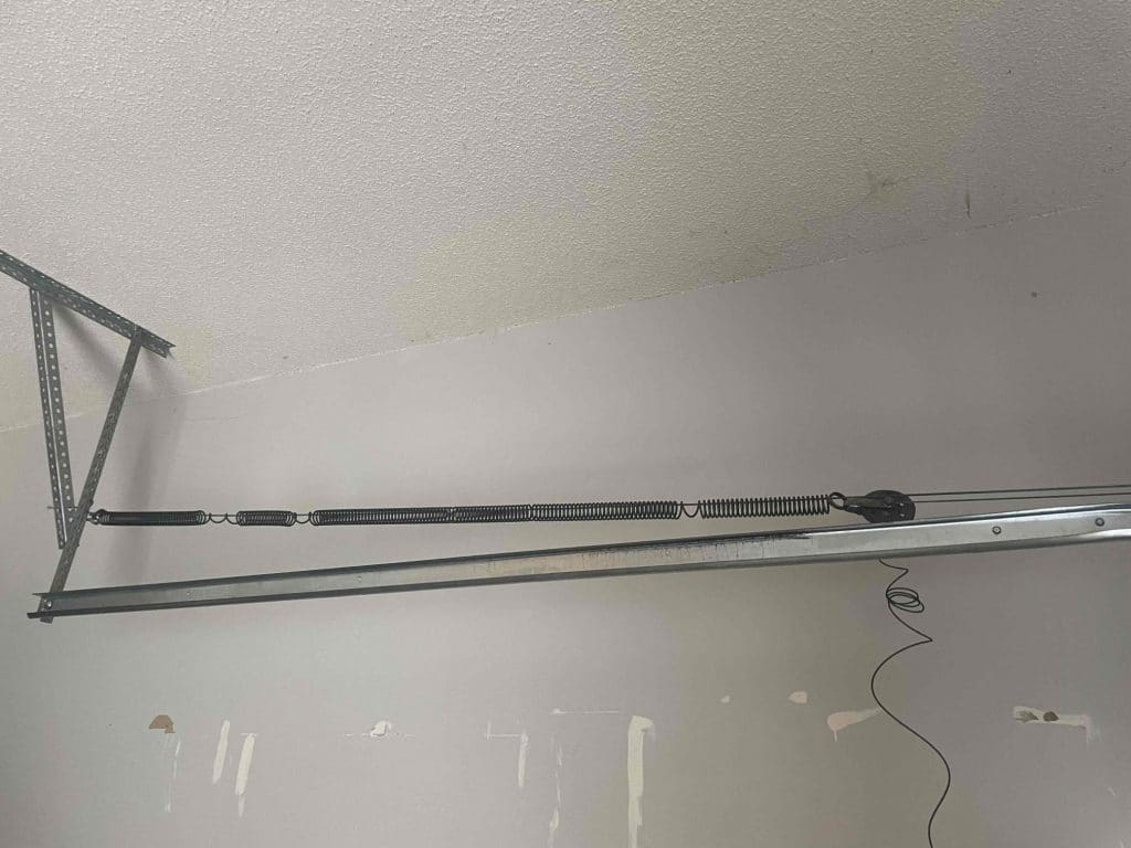How Galveston Homeowners Can Spot Early Signs of Garage Door Spring Wear and Tear